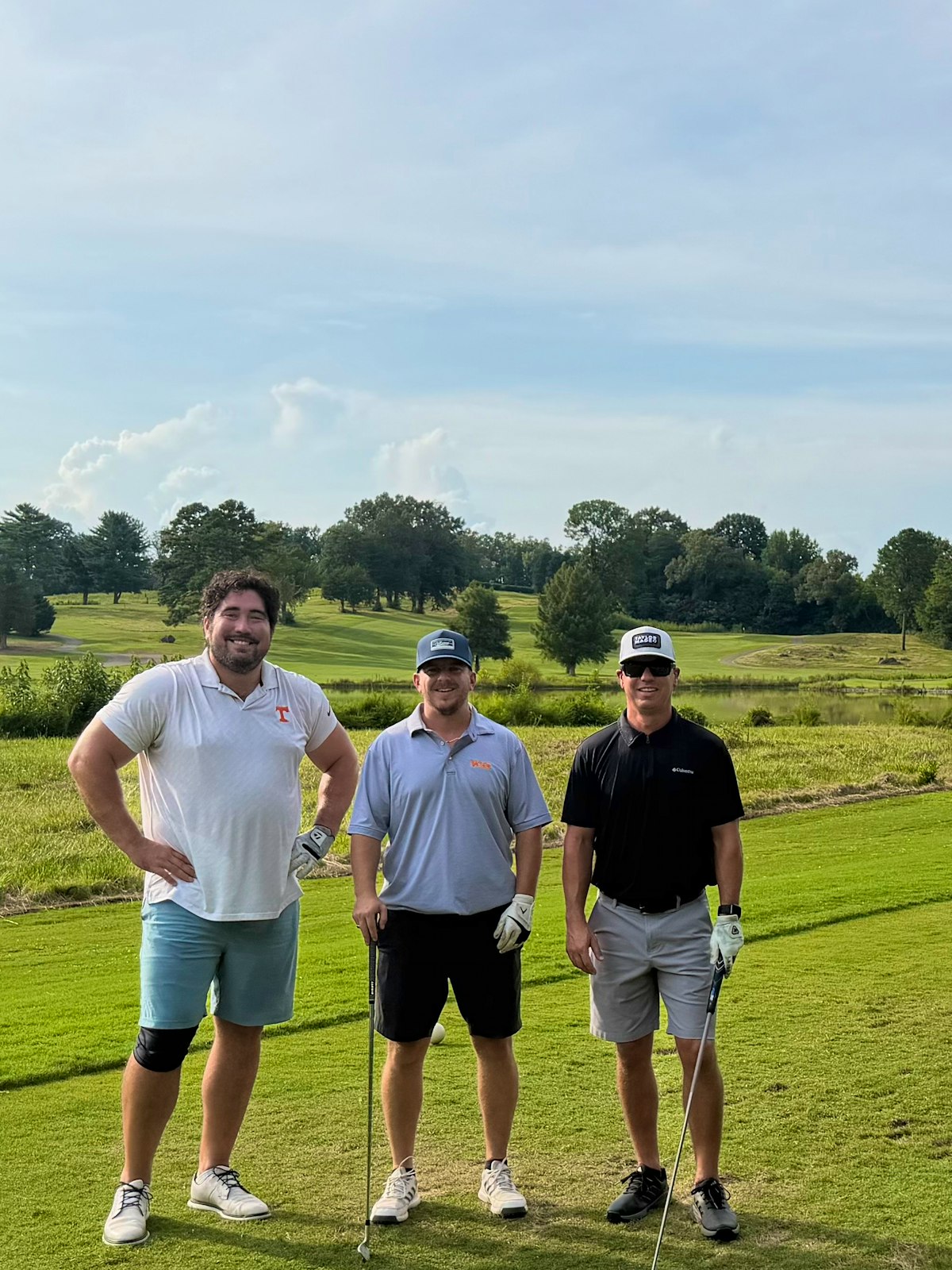 A Spark league group on the tee